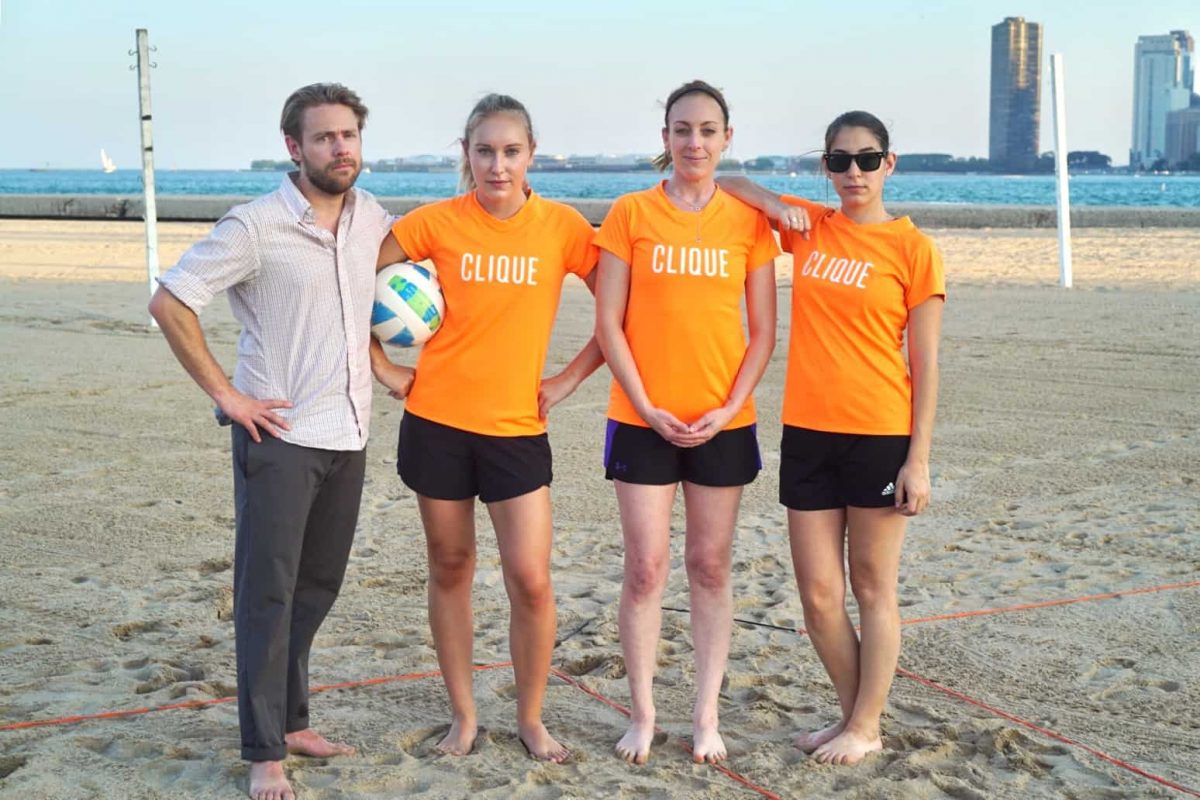 Clique team playing beach volleyball
