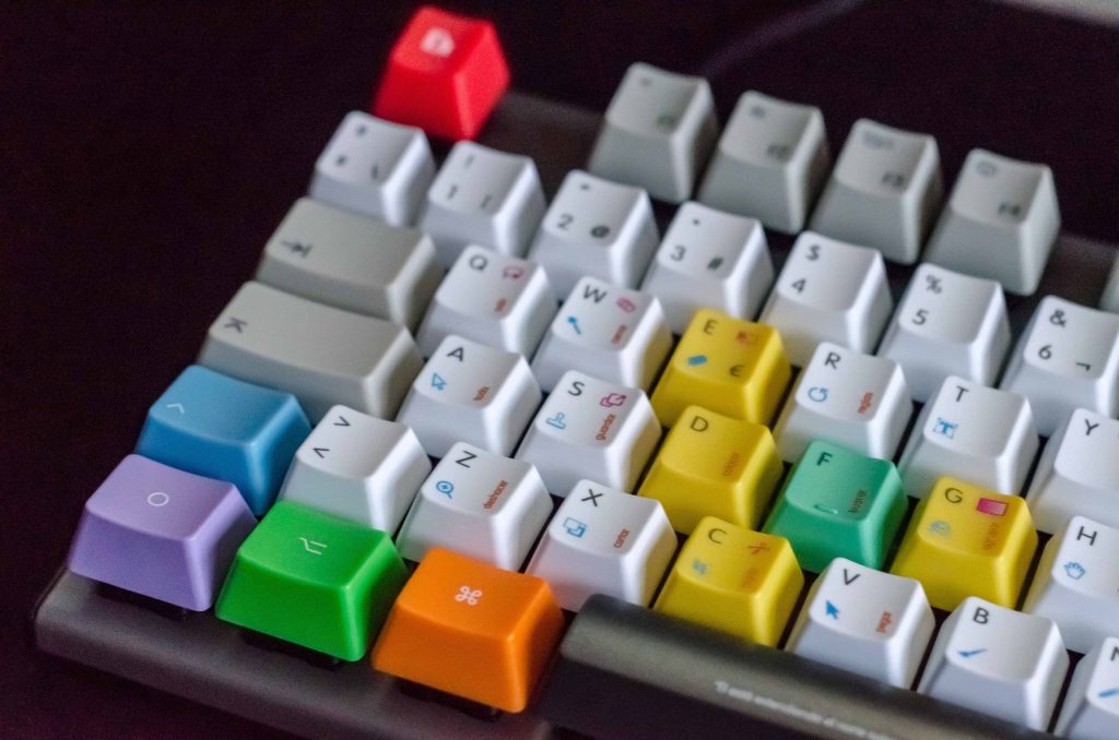 a tactile keyboard with raised and color coded keys