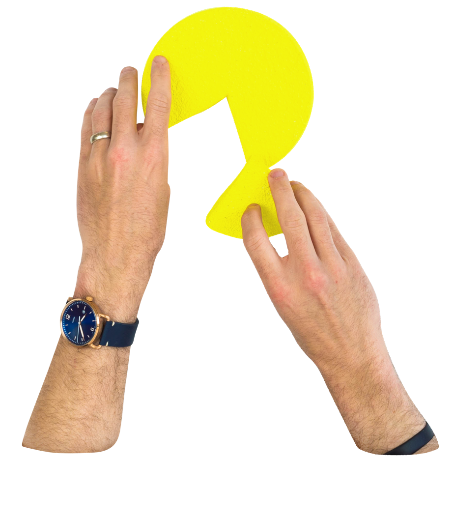 Hands putting together a pie chart with a missing piece