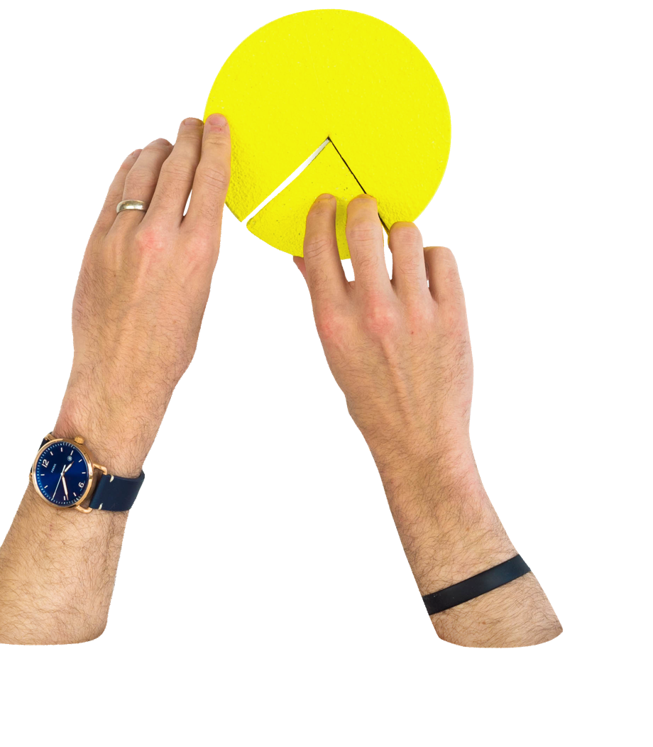 Hands putting together a pie chart with a missing piece