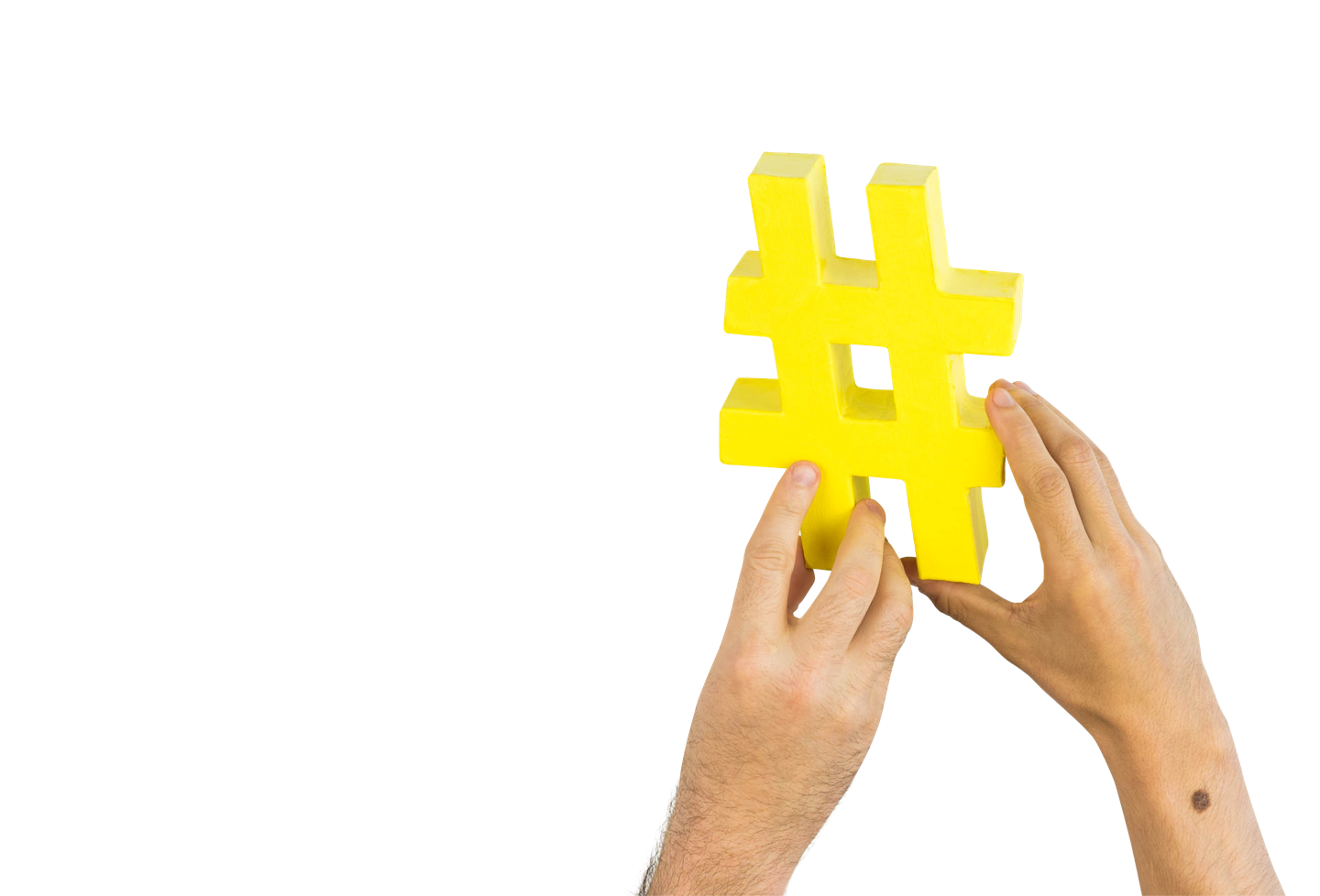 Two hands passing a hashtag along
