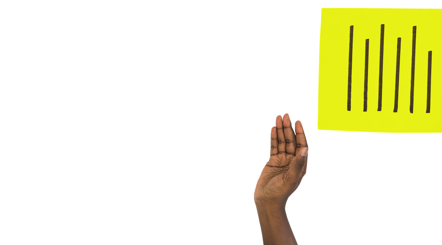 Two hands passing a piece of paper with writing on it