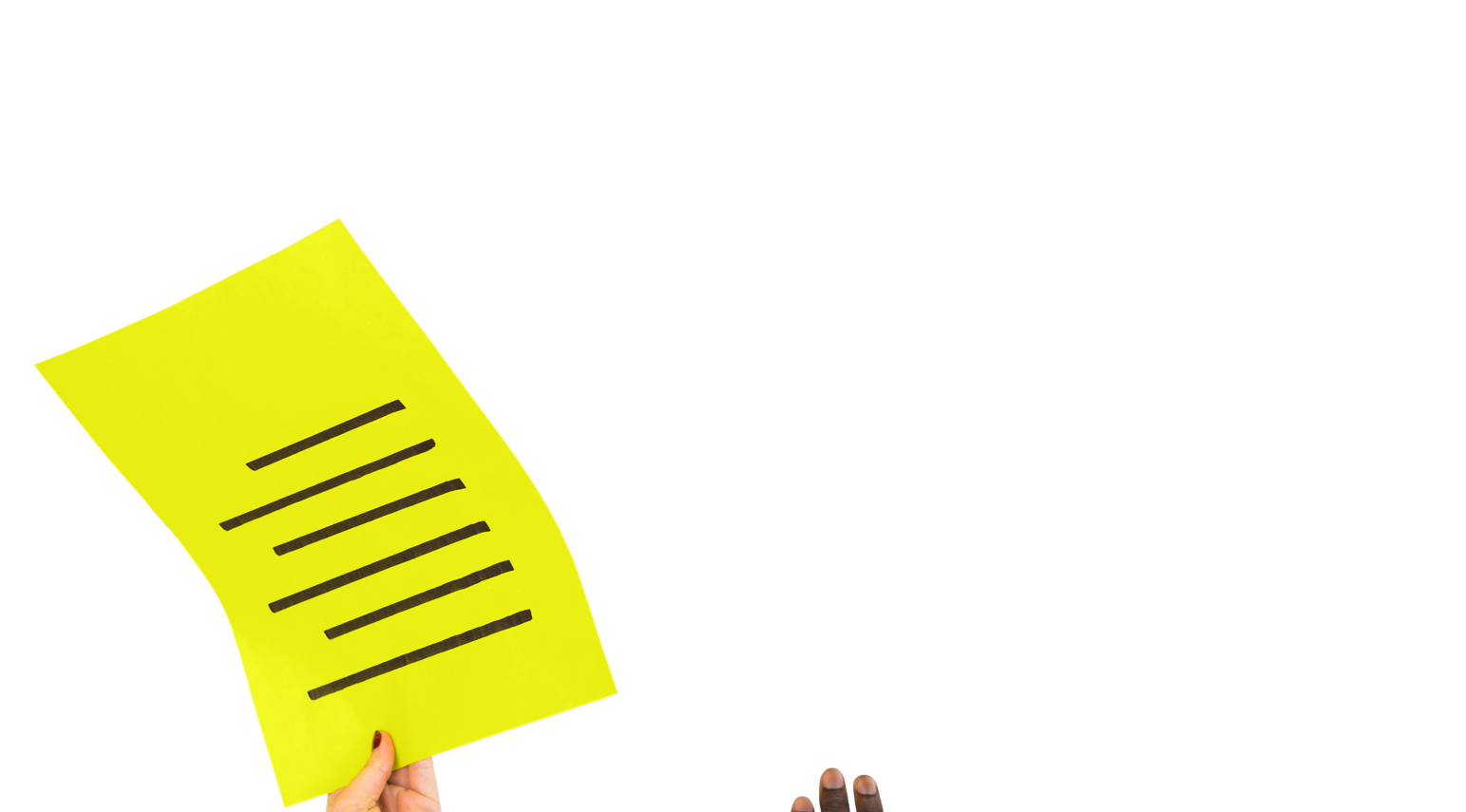 Two hands passing a piece of paper with writing on it